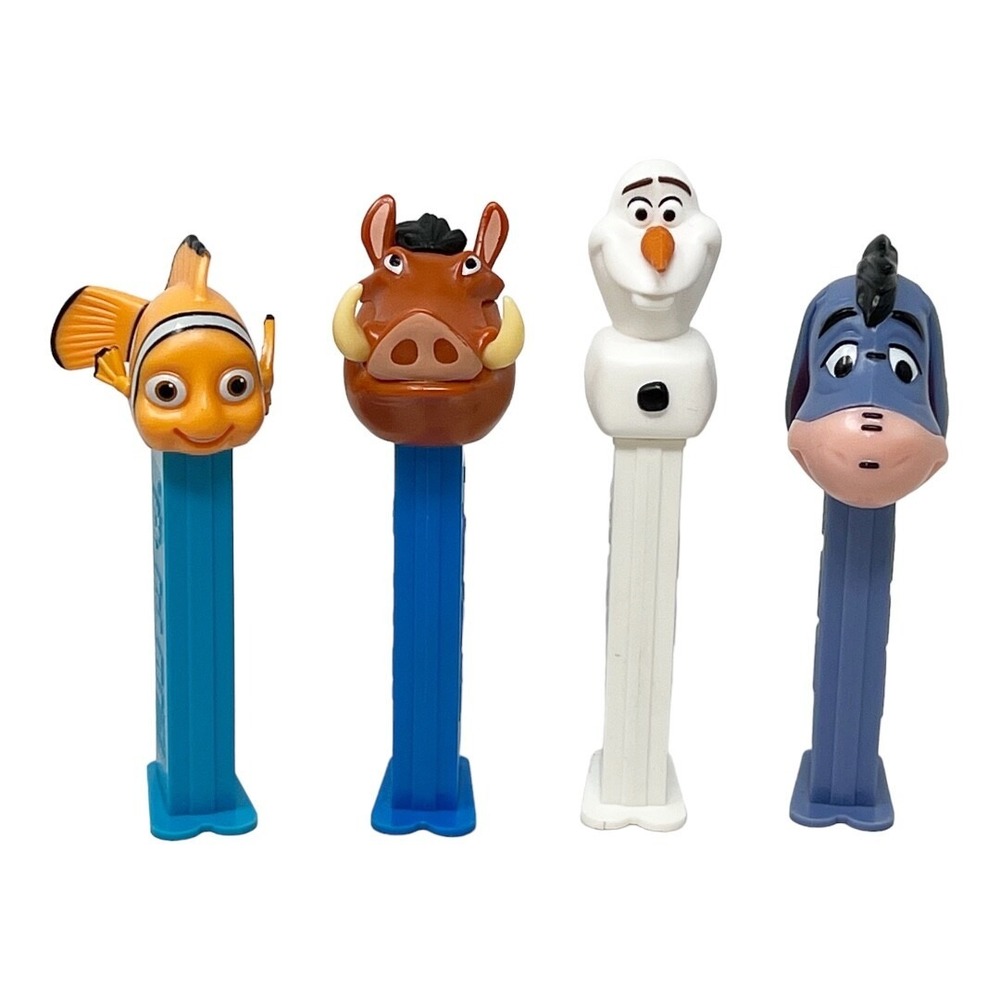 Pez Dispensers 4 Piece Lot Disney Nemo, Pumba, Olaf, Eeyore.